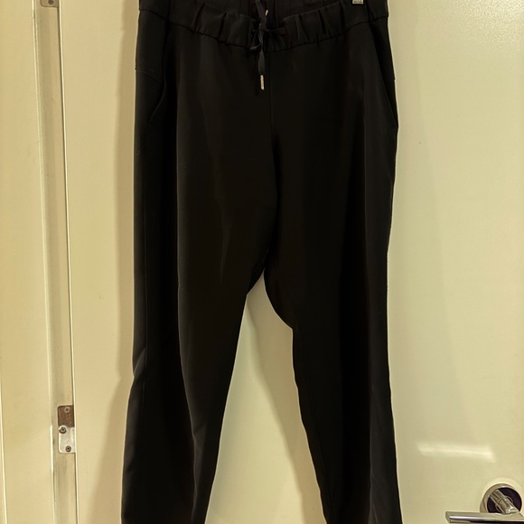 Lululemon “On the Fly Mid-rise” Pant (travel woven) - Black - Picture 2 of 3